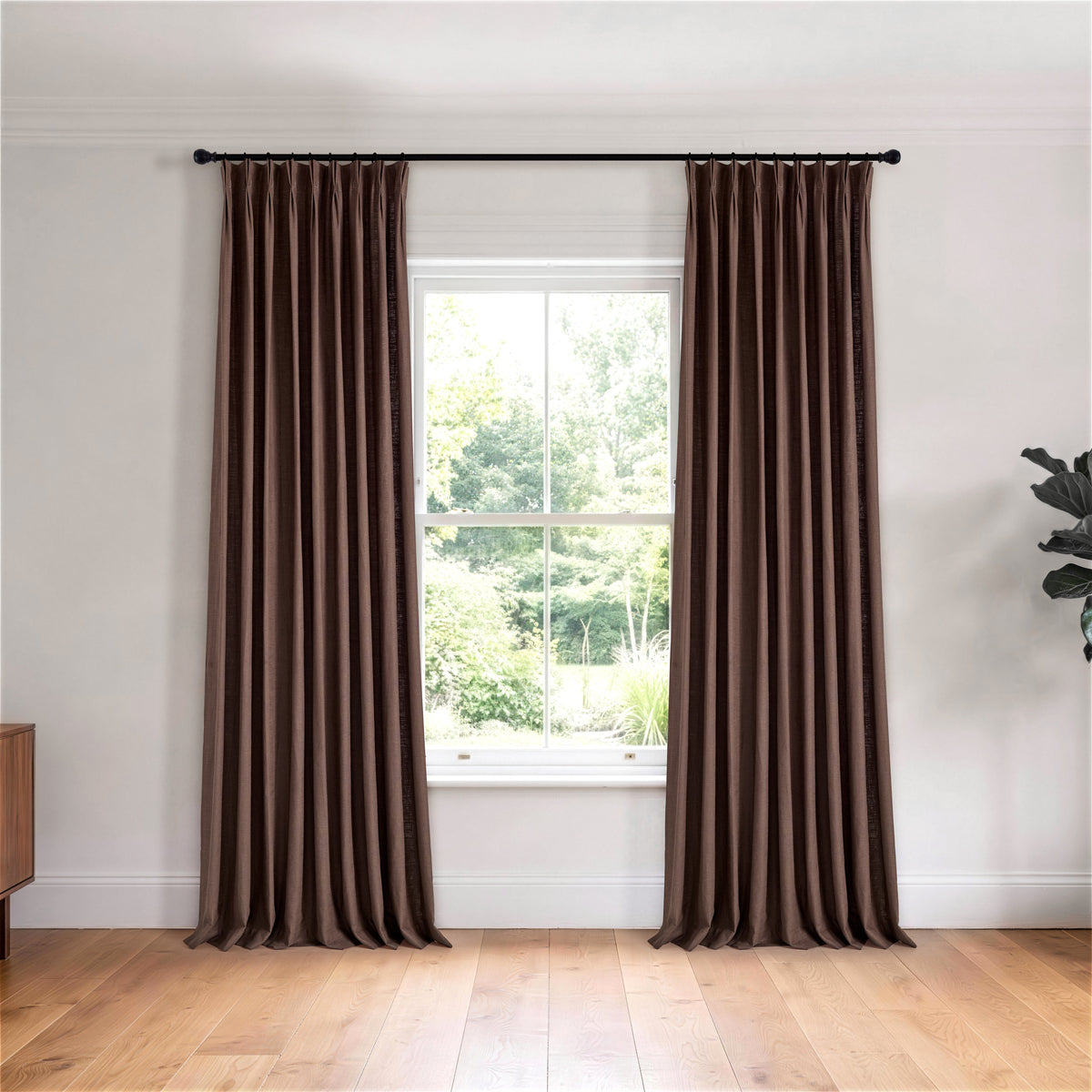 Edwina Linen-Cotton Curtains in Espresso, hanging in a room