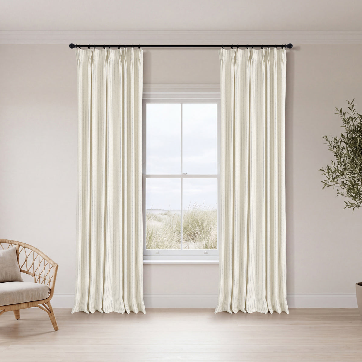 Ansel Pinstripe Weave Curtains in Cool Ivory, hanging in a room