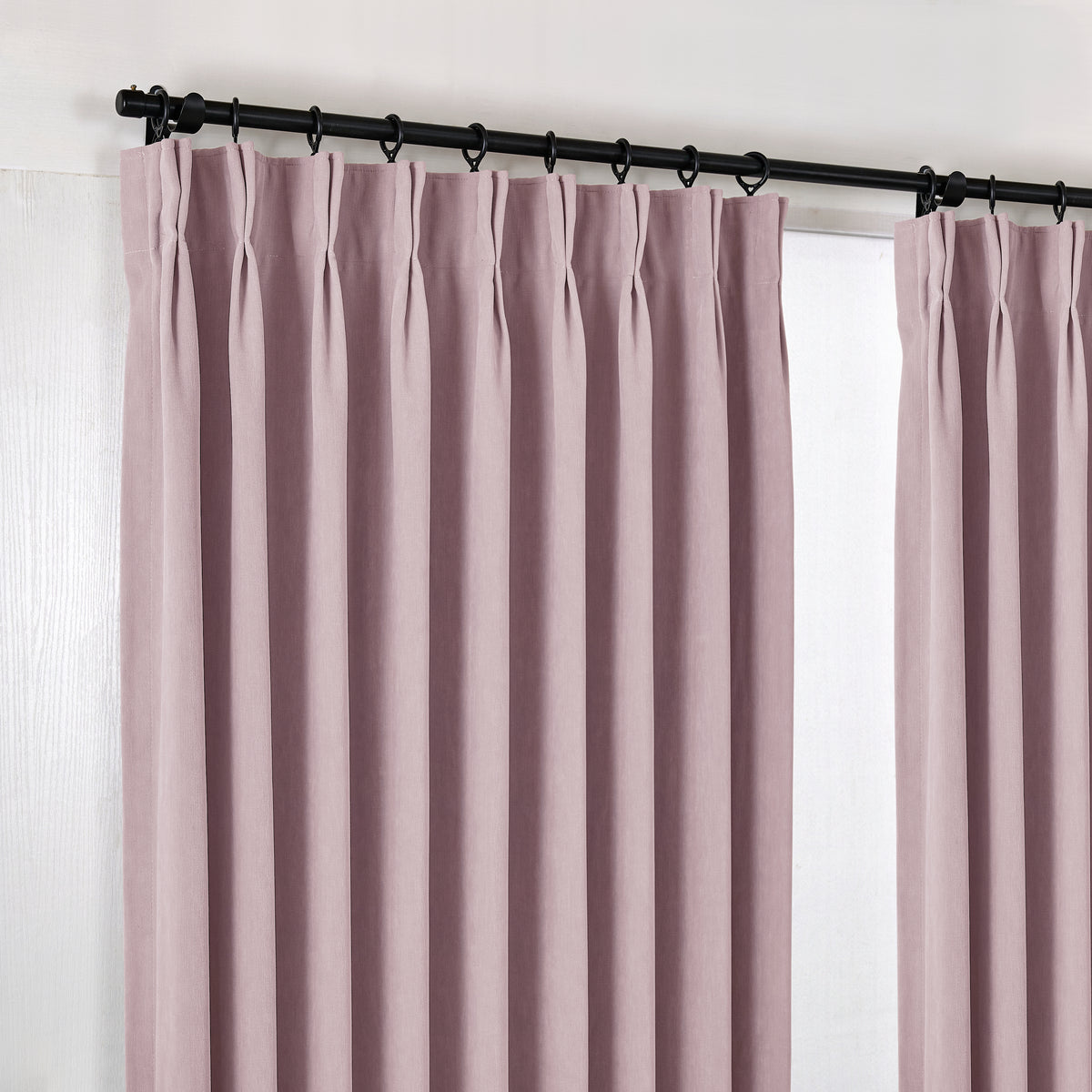 Genevieve Cloud-Soft Chenille Blackout Curtains in Mauve, hanging at the window