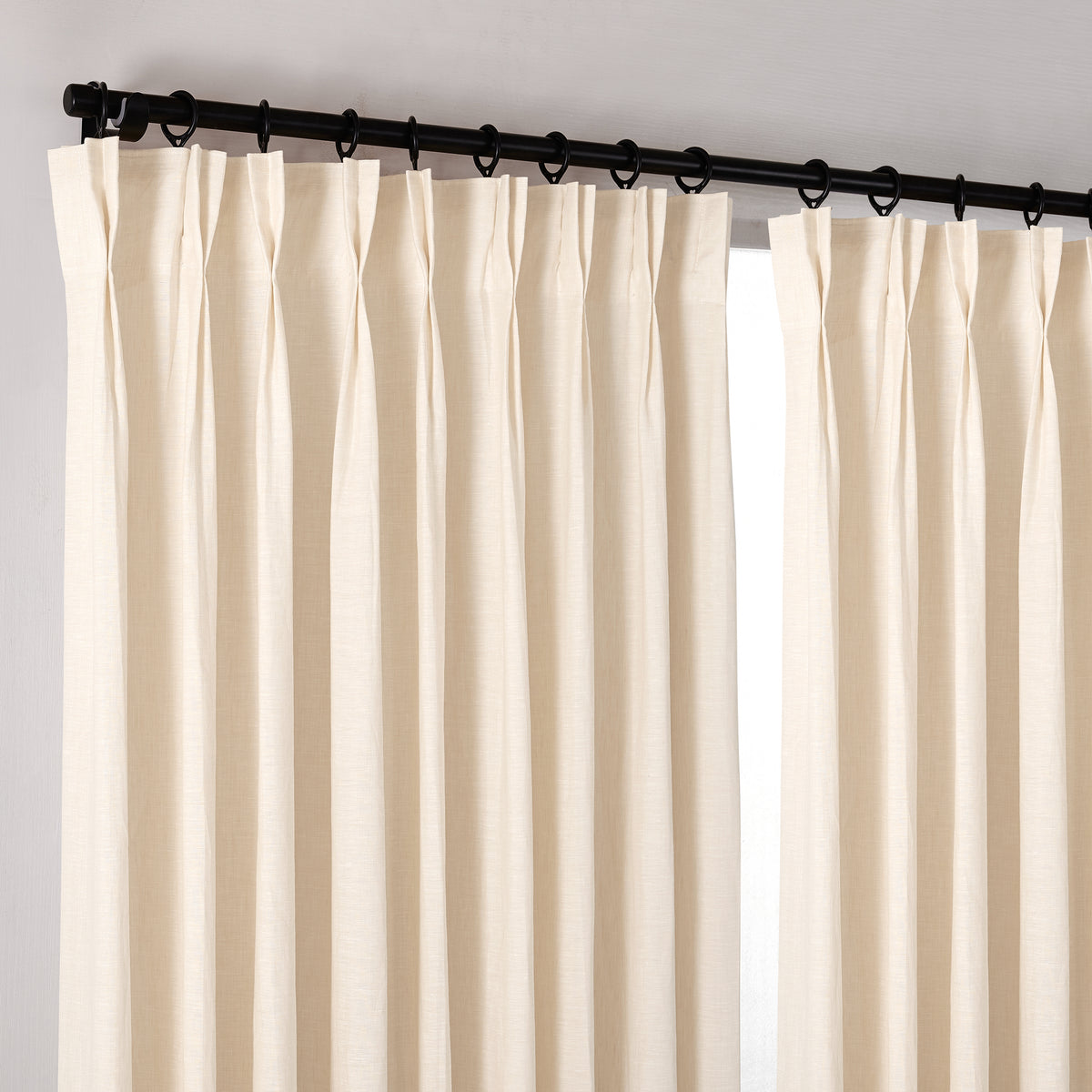 Rafe Slubbed Pure Linen Curtains in Blush, hanging at the window