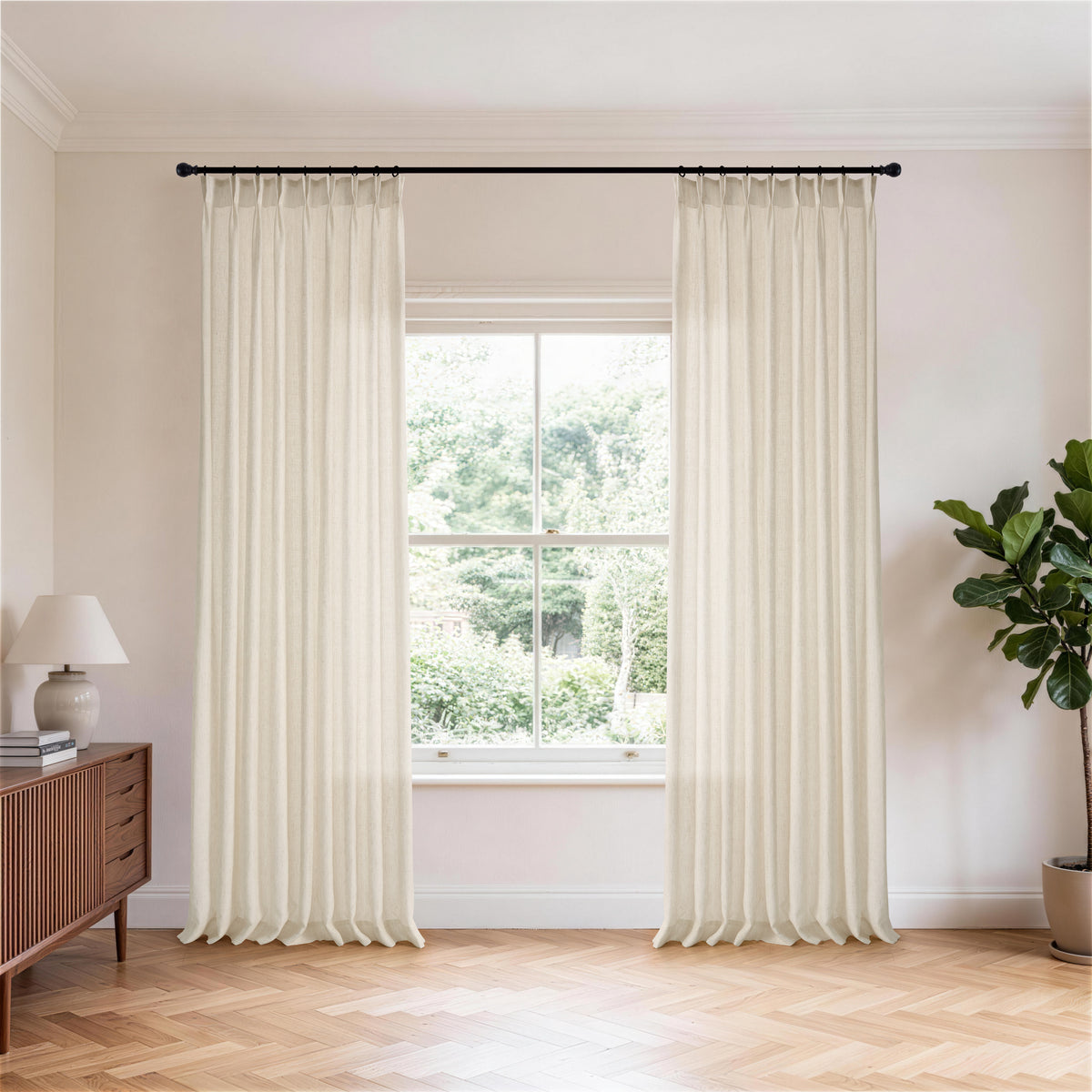 Noemi Linen-Blend Sheer Curtains in Warm Chalk, hanging in a room