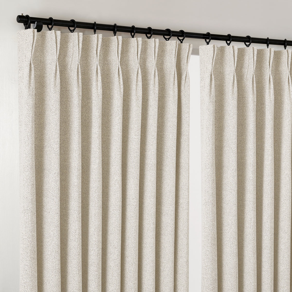 Pembroke Flecked Weave Curtains in Oat, hanging at the window