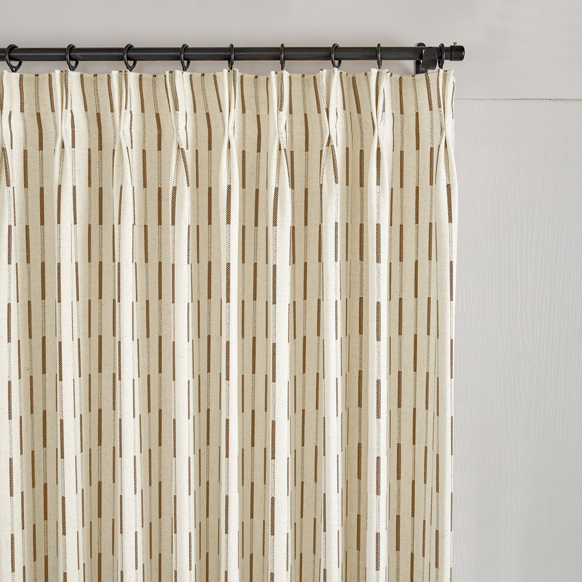 Ansel Dash Stripe Weave Curtains in Caramel, pleated header close up