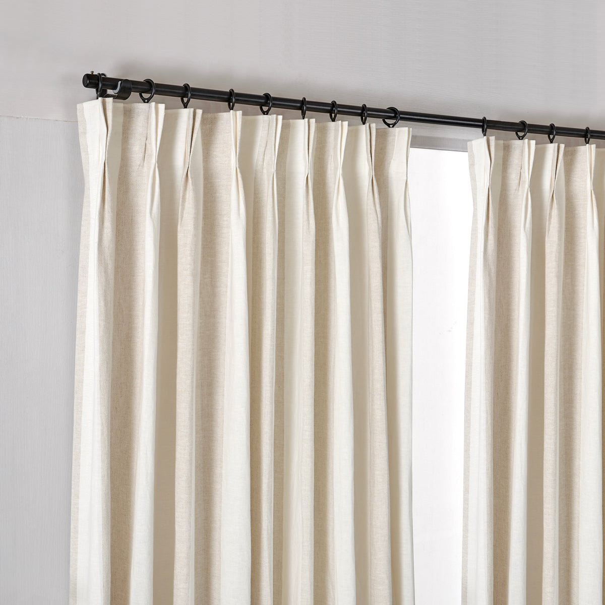Carrick Striped Pure Linen Curtains in Flax Fine Check, hanging at the window