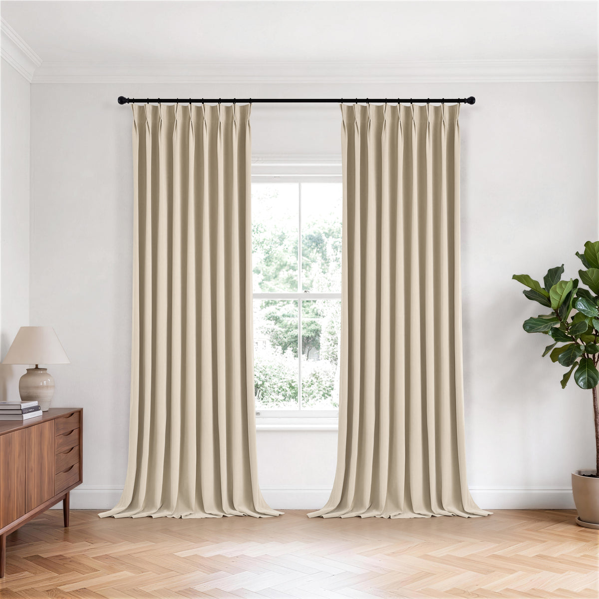 Sebastian Double-Faced Velvet Blackout Curtains in Flax, hanging in a room