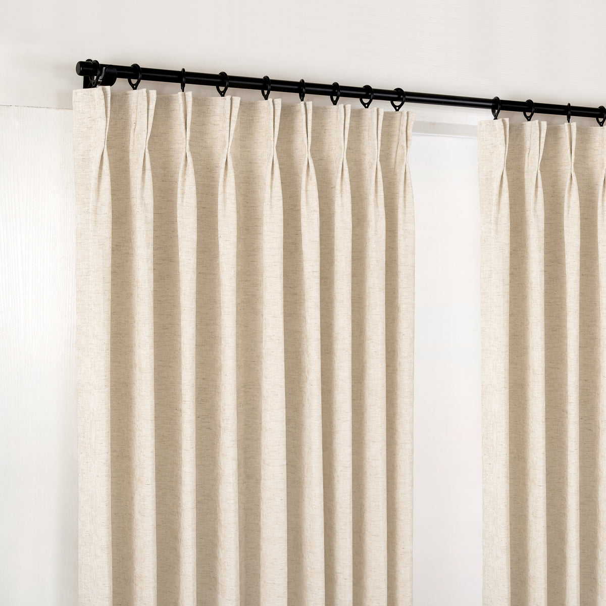 Prentiss Reversible Slub Curtains in Oat, hanging at the window