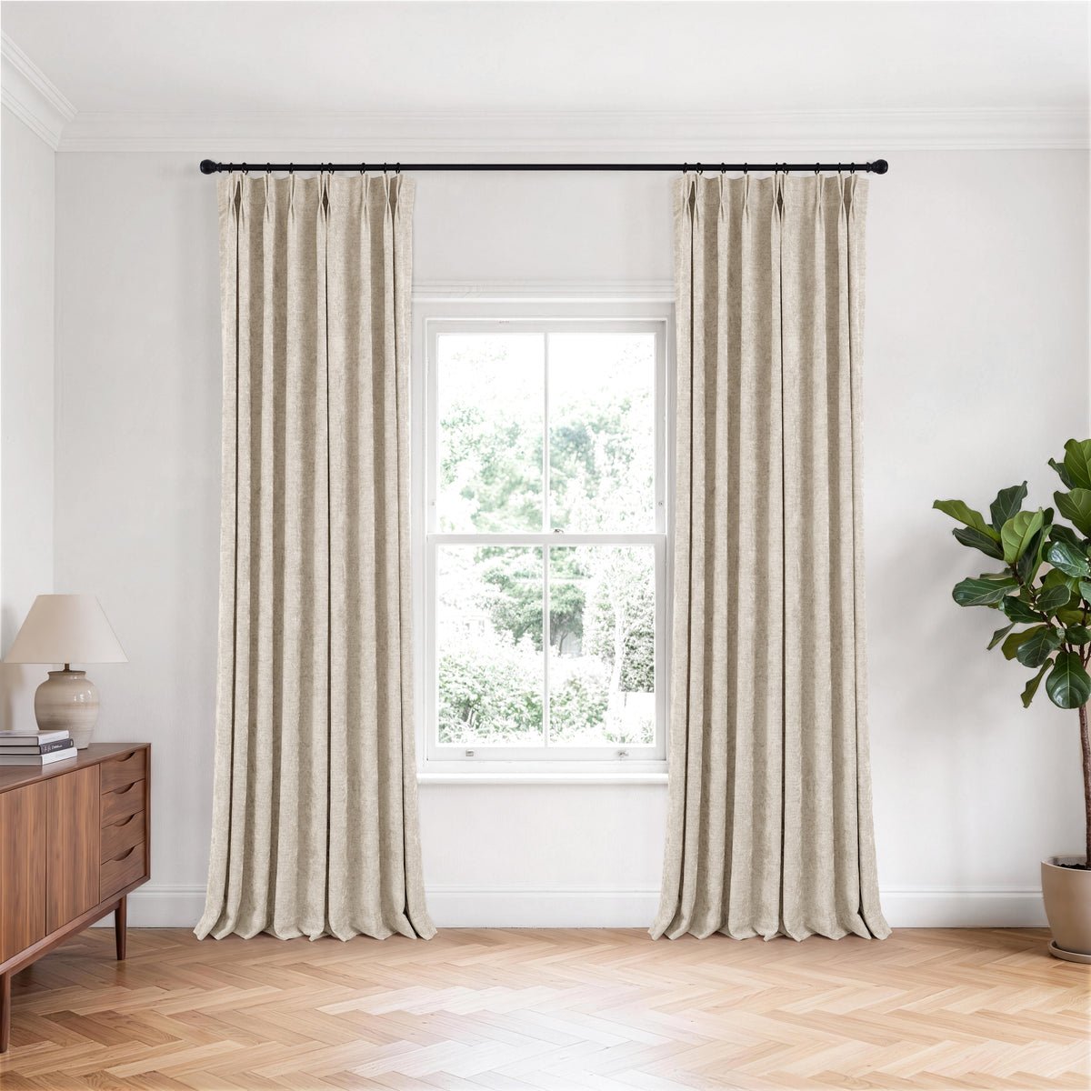 Prentiss Reversible Slub Curtains in Greige, hanging in a room