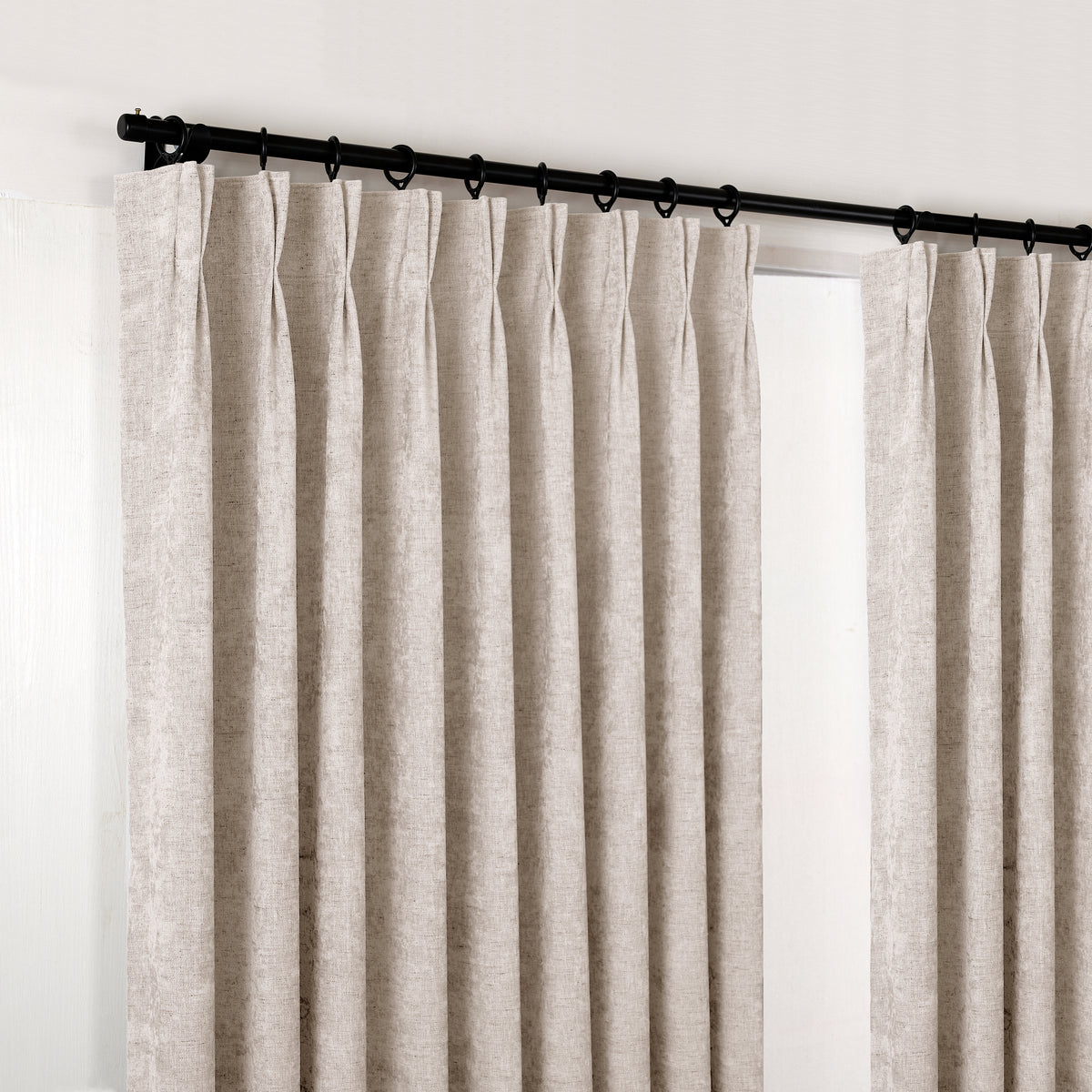Prentiss Reversible Slub Curtains in Deep Greige, hanging at the window
