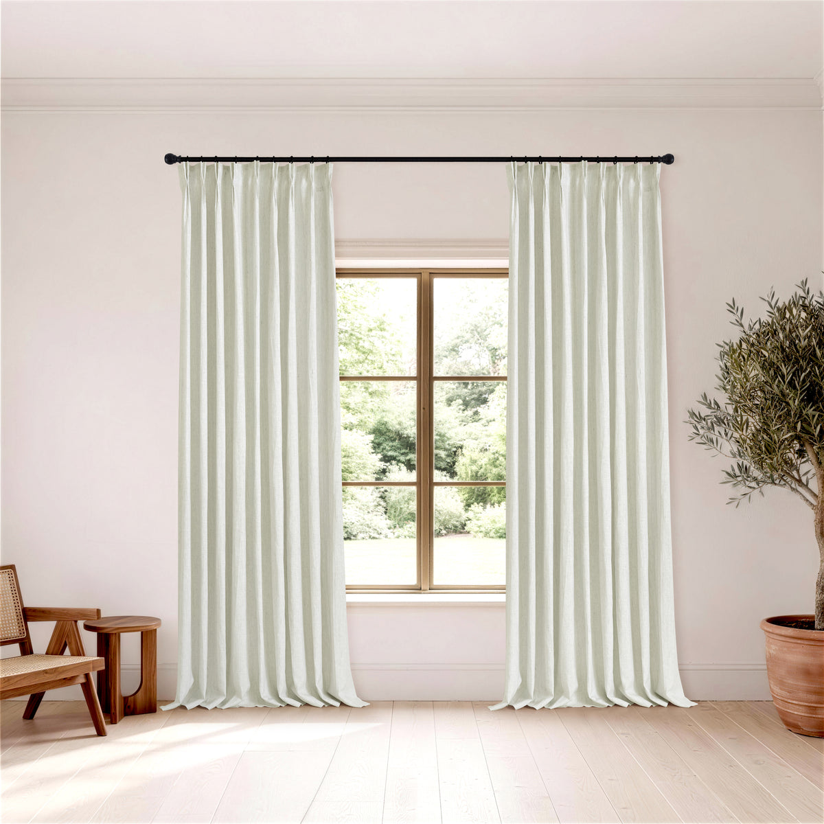 Rafe Slubbed Pure Linen Curtains in Chalk, hanging in a room