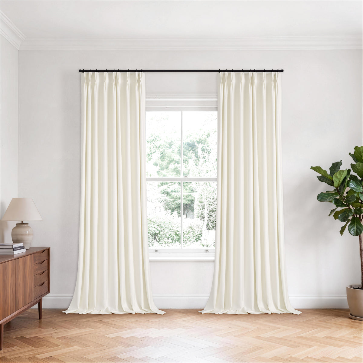 Forrester Linen-Blend Slub Curtains in Chalk, hanging in a room