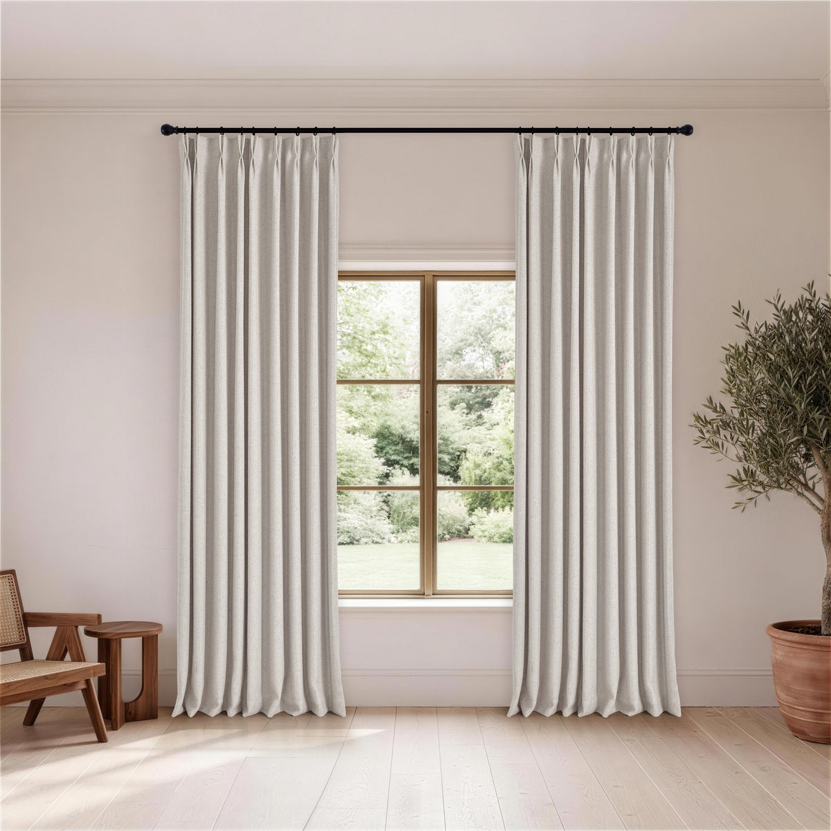 Ansel Slub Weave Curtains in Greige, hanging in a room