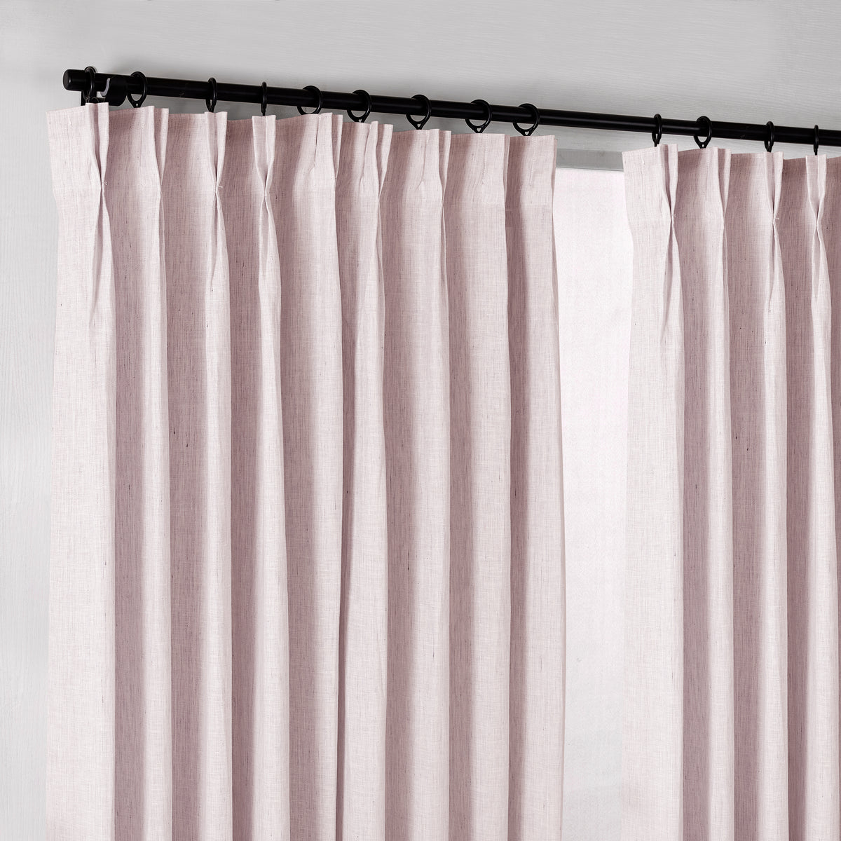 Rafe Slubbed Pure Linen Curtains in Dusty Rose, hanging at the window