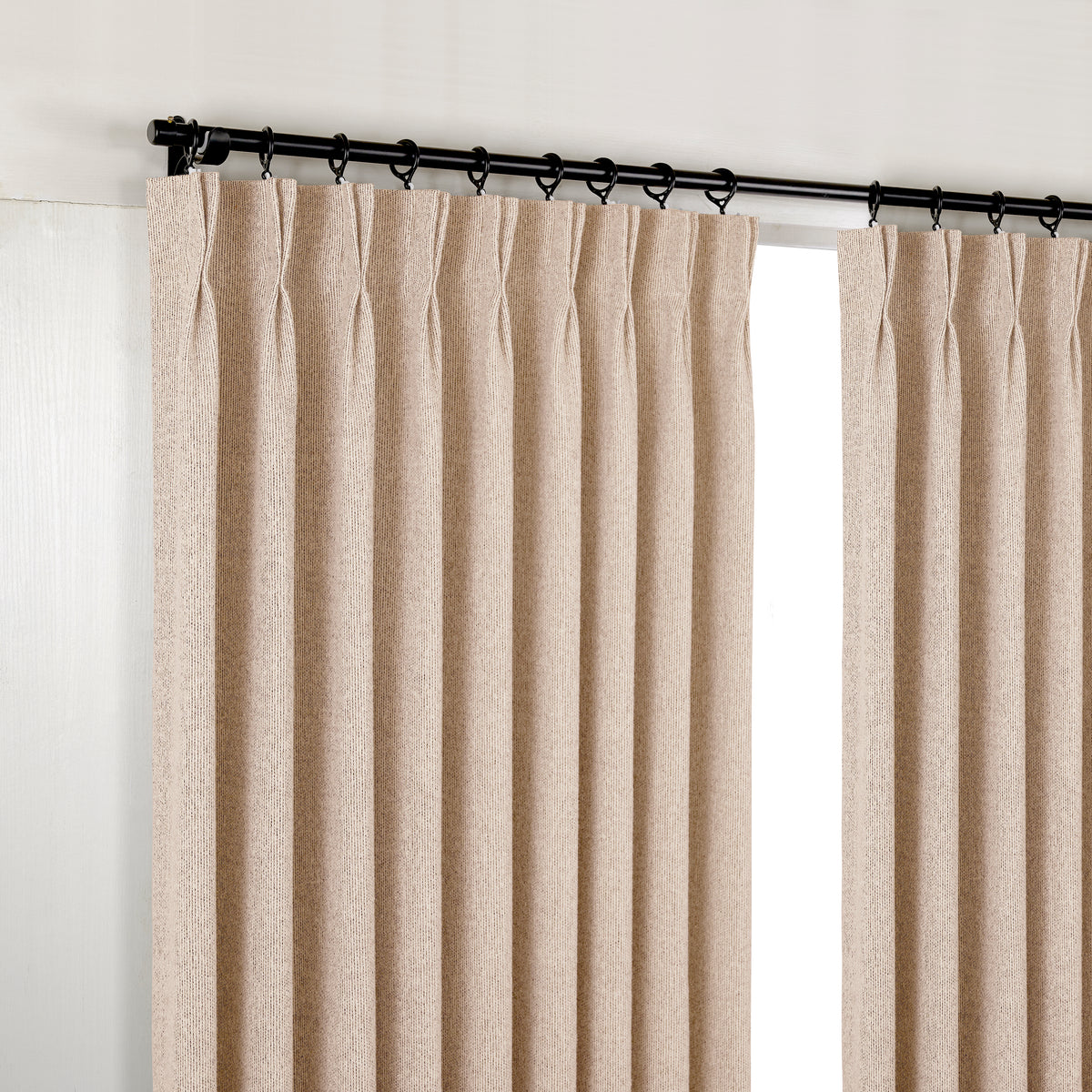 Pembroke Rib Weave Curtains in Sand, hanging at the window