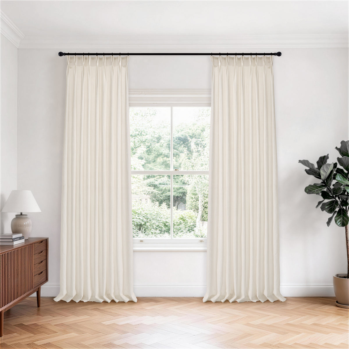 Esme Fine Voile Sheer Curtains in Greige, hanging in a room