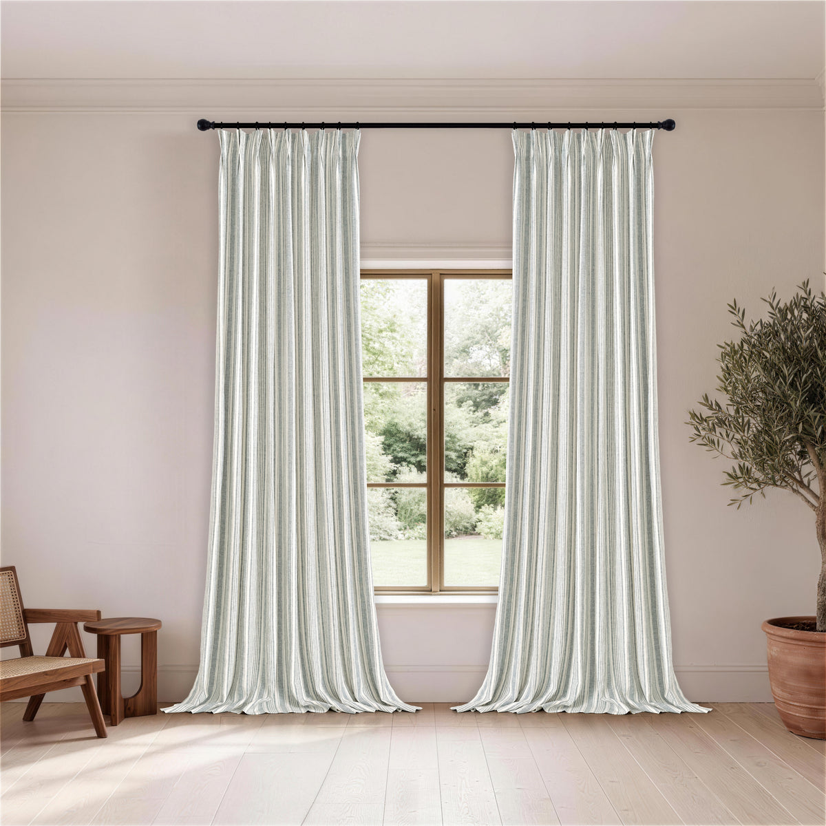 Carrick Striped Pure Linen Curtains in Juniper Ticking, hanging in a room