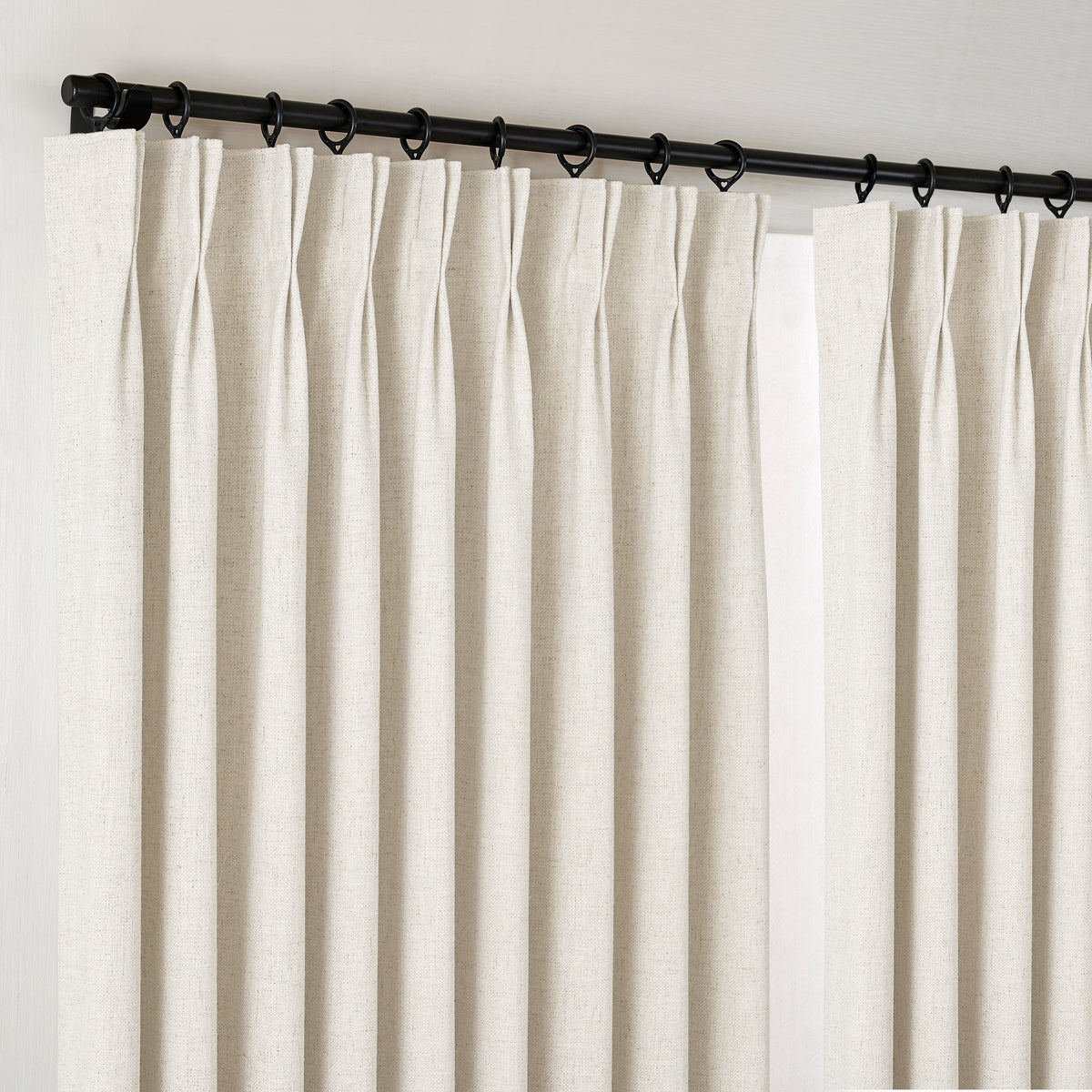 Forrester Linen-Blend Slub Curtains in Ivory, hanging at the window