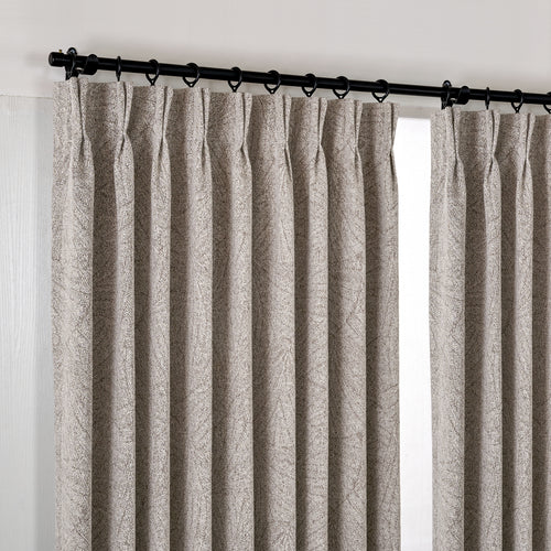 Bramwell Leaf Jacquard Blackout Curtains in Mauve, hanging at the window