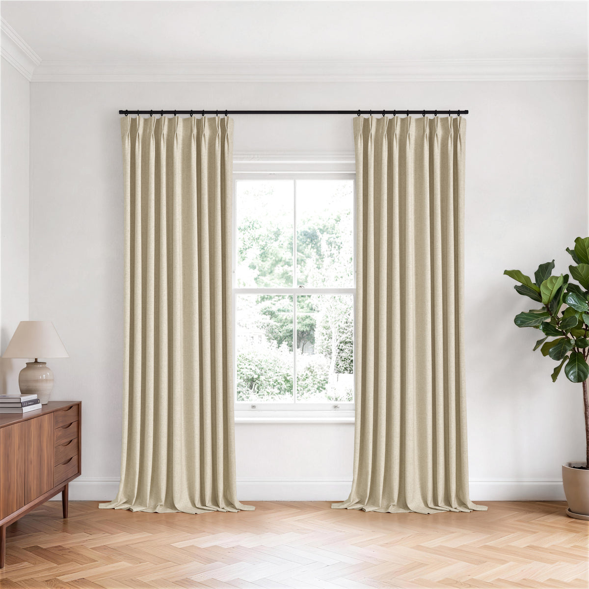 Forrester Linen-Blend Slub Curtains in Sand, hanging in a room