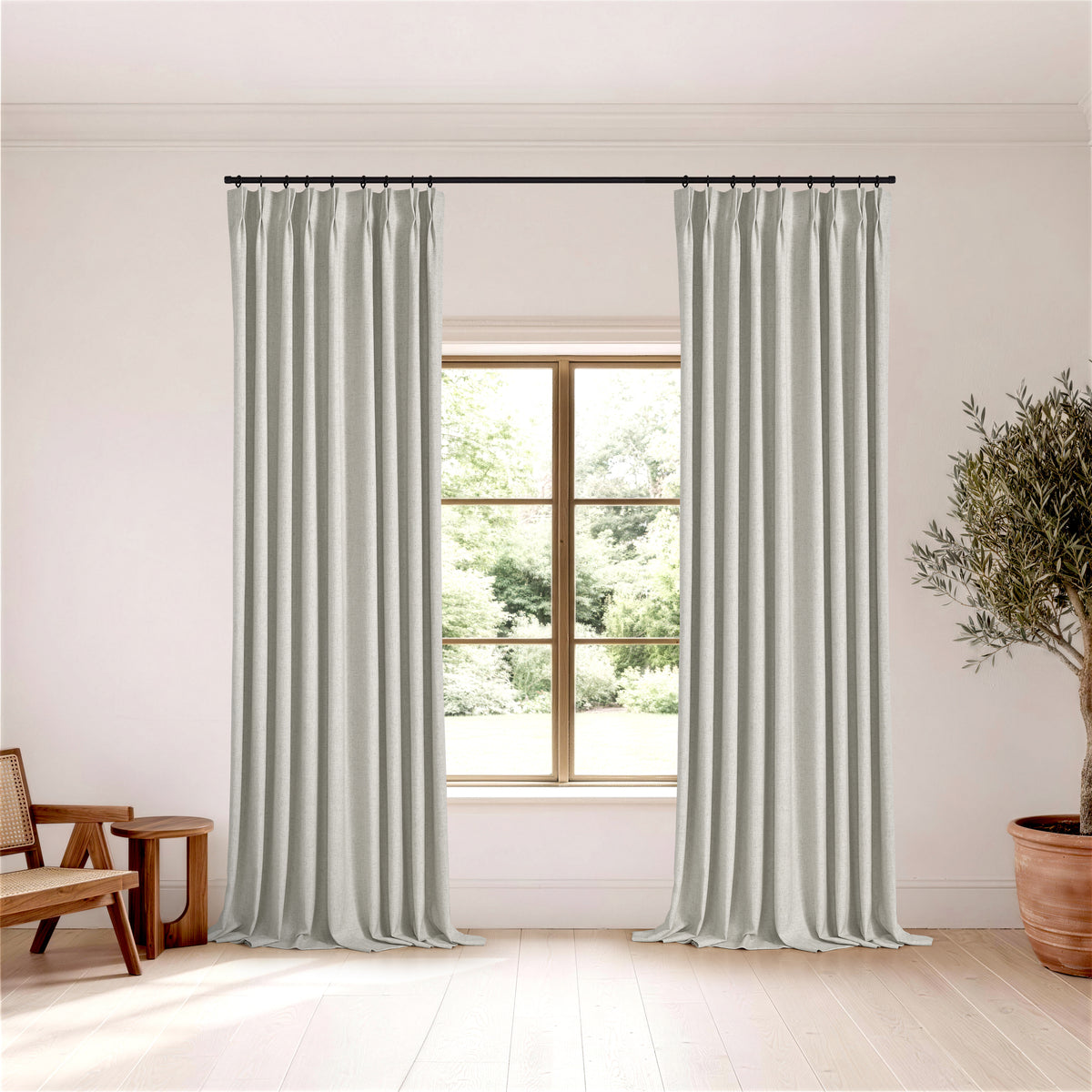 Forrester Linen-Blend Slub Curtains in Cool Greige, hanging in a room