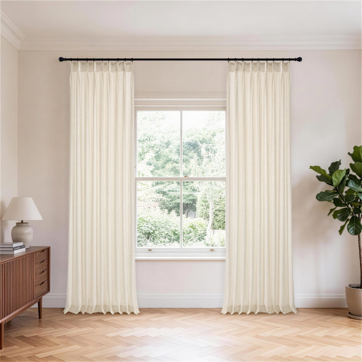 Isabeau Chevron Voile Sheer Curtains in Chalk, hanging in a room