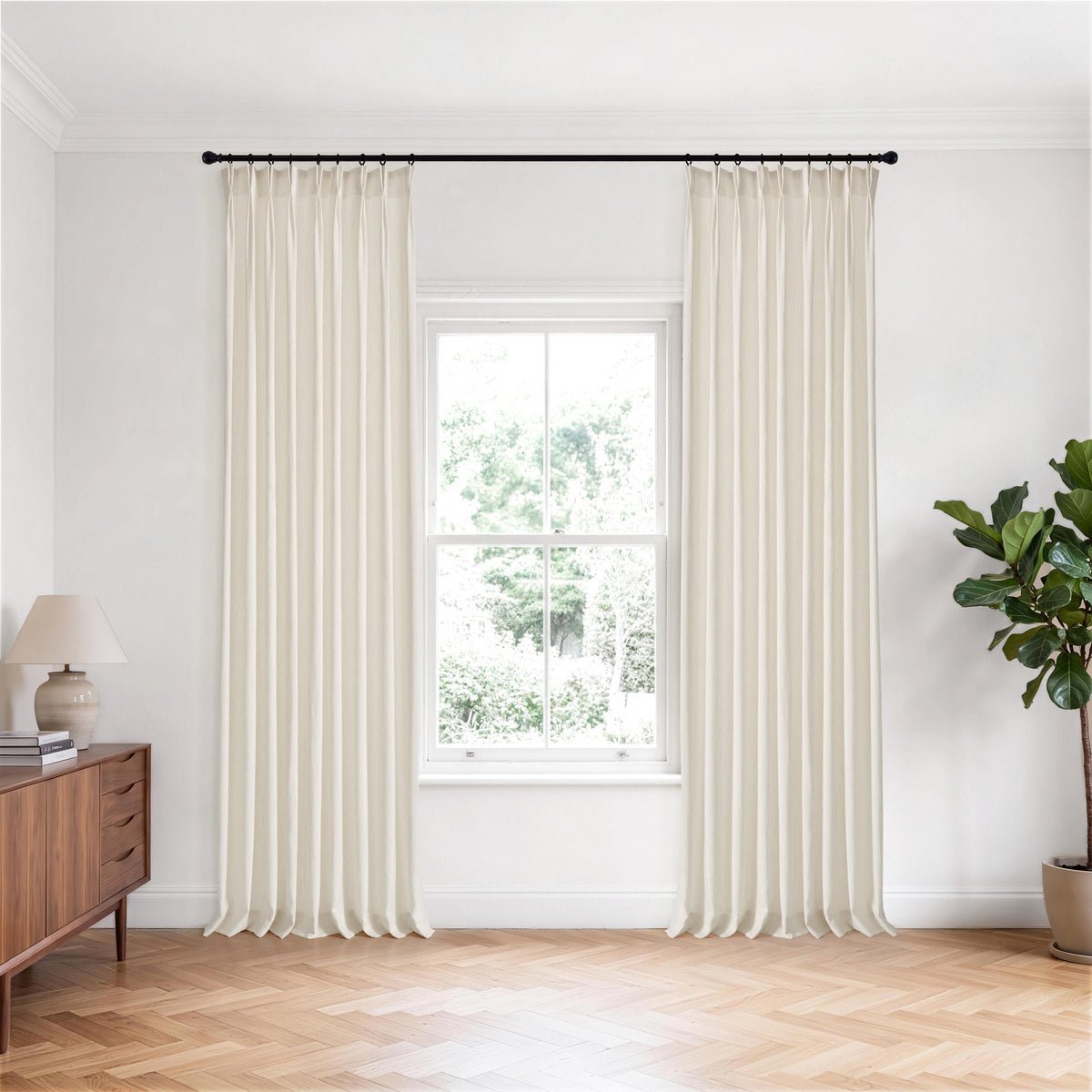 Odile Vine Sheer Curtains in Beige, hanging in a room