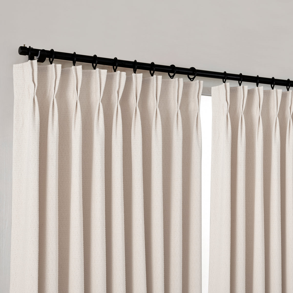 Pembroke Basket Weave Curtains in Oat, hanging at the window