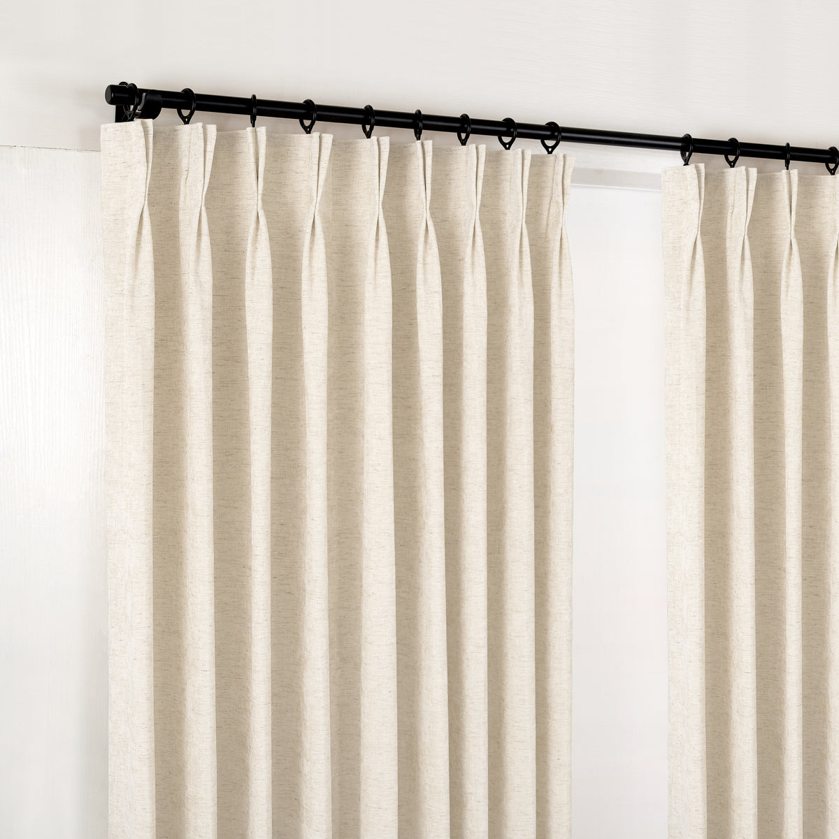 Prentiss Reversible Slub Curtains in Ivory, hanging at the window