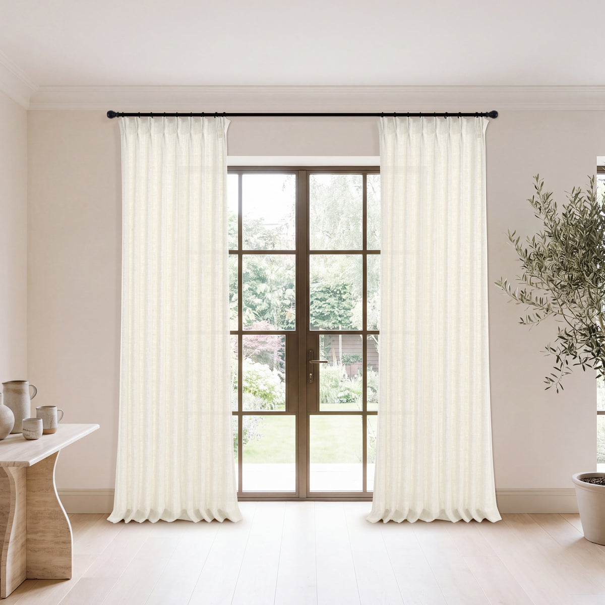 Lockwood Open-Grid Weave Curtains in Oat, hanging in a room