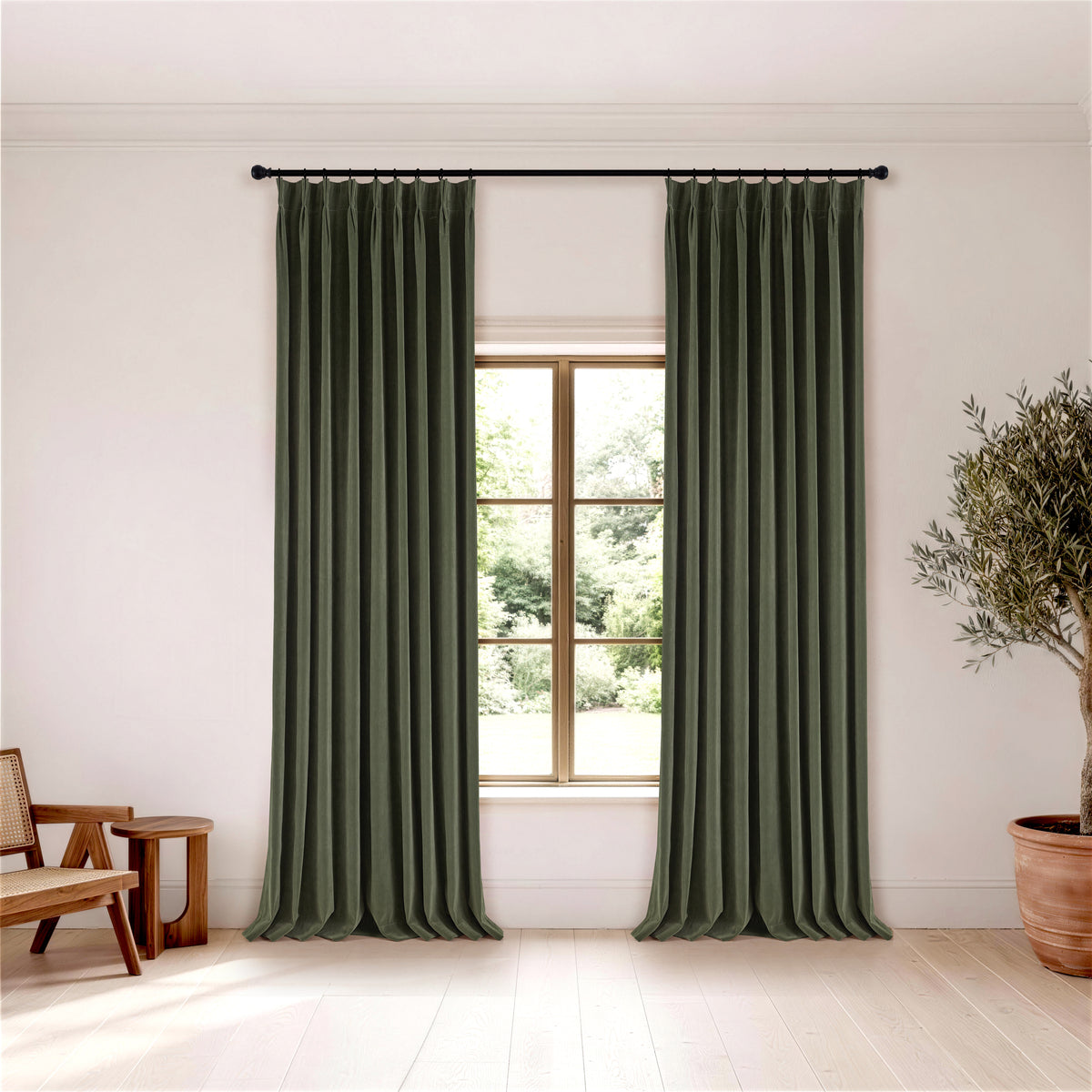 Sebastian Double-Faced Velvet Blackout Curtains in Forest, hanging in a room