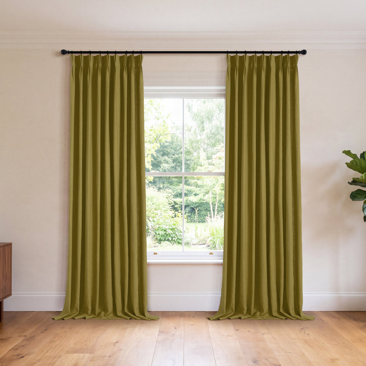 Ainsley Pure Linen Curtains in Olive, hanging in a room