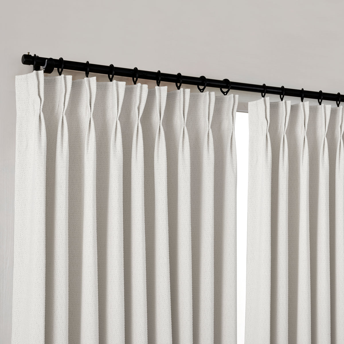 Pembroke Basket Weave Curtains in Cool Chalk, hanging at the window