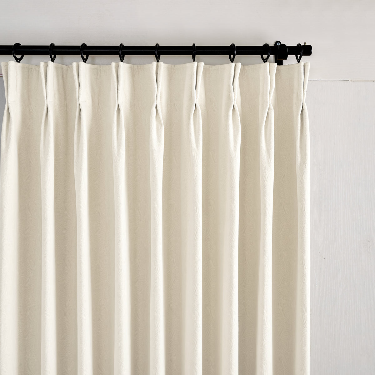 Cordelia Sculpted Chenille Blackout Curtains in Oat, pleated header close up