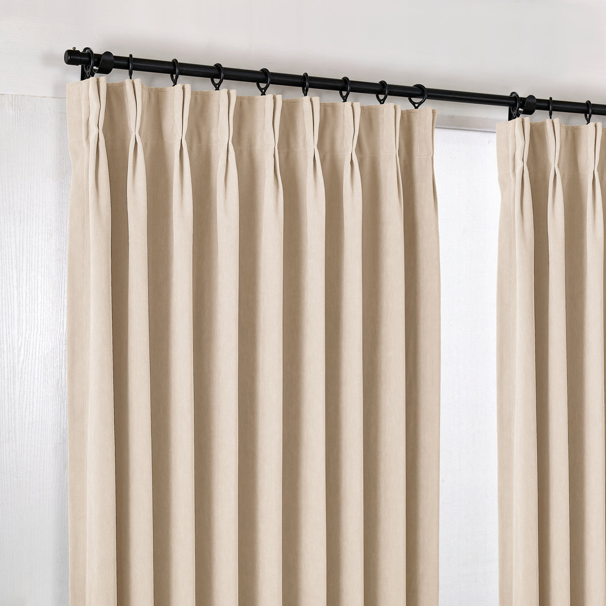 Genevieve Cloud-Soft Chenille Blackout Curtains in Flax, hanging at the window