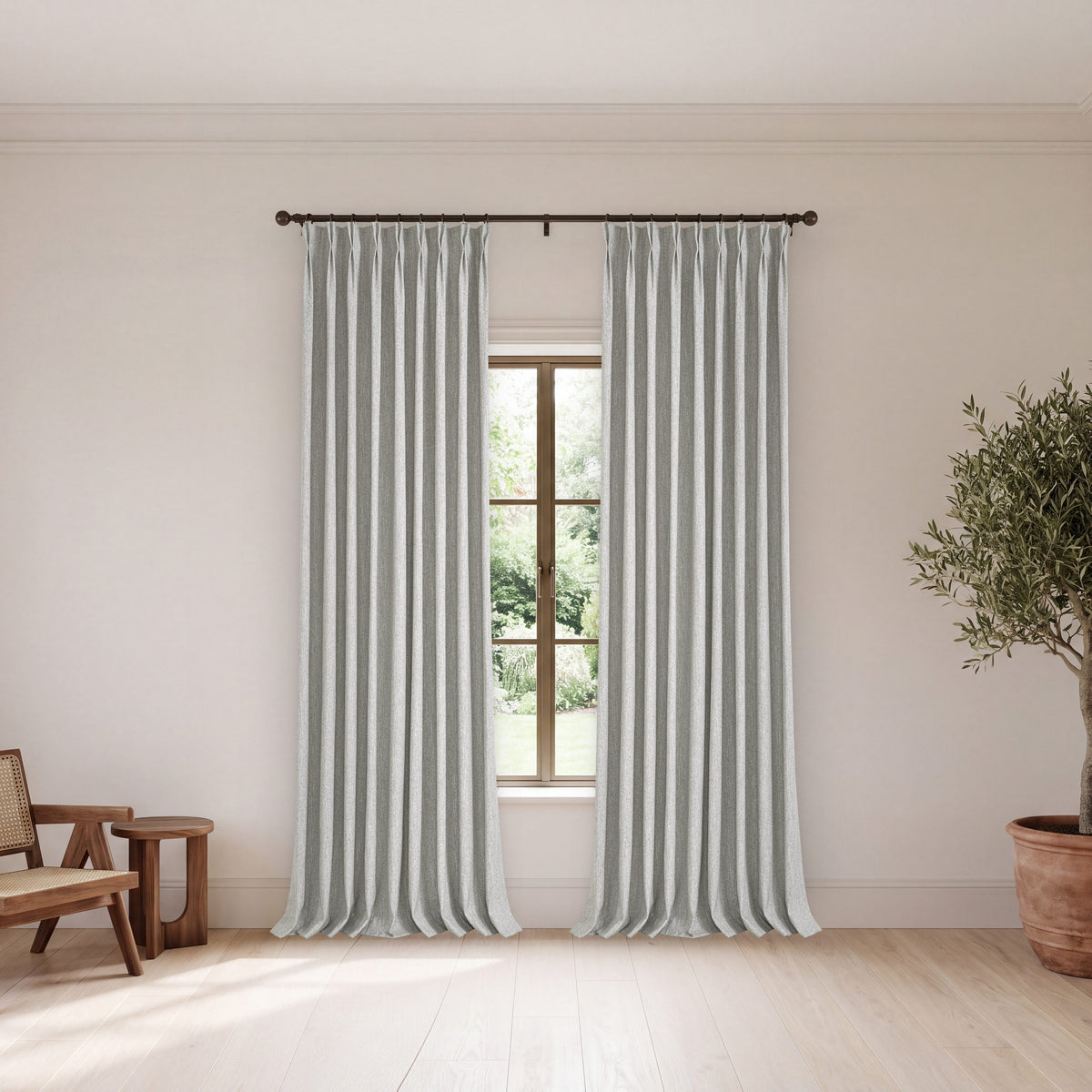Laurence Heathered Weave Curtains in Ash, hanging in a room