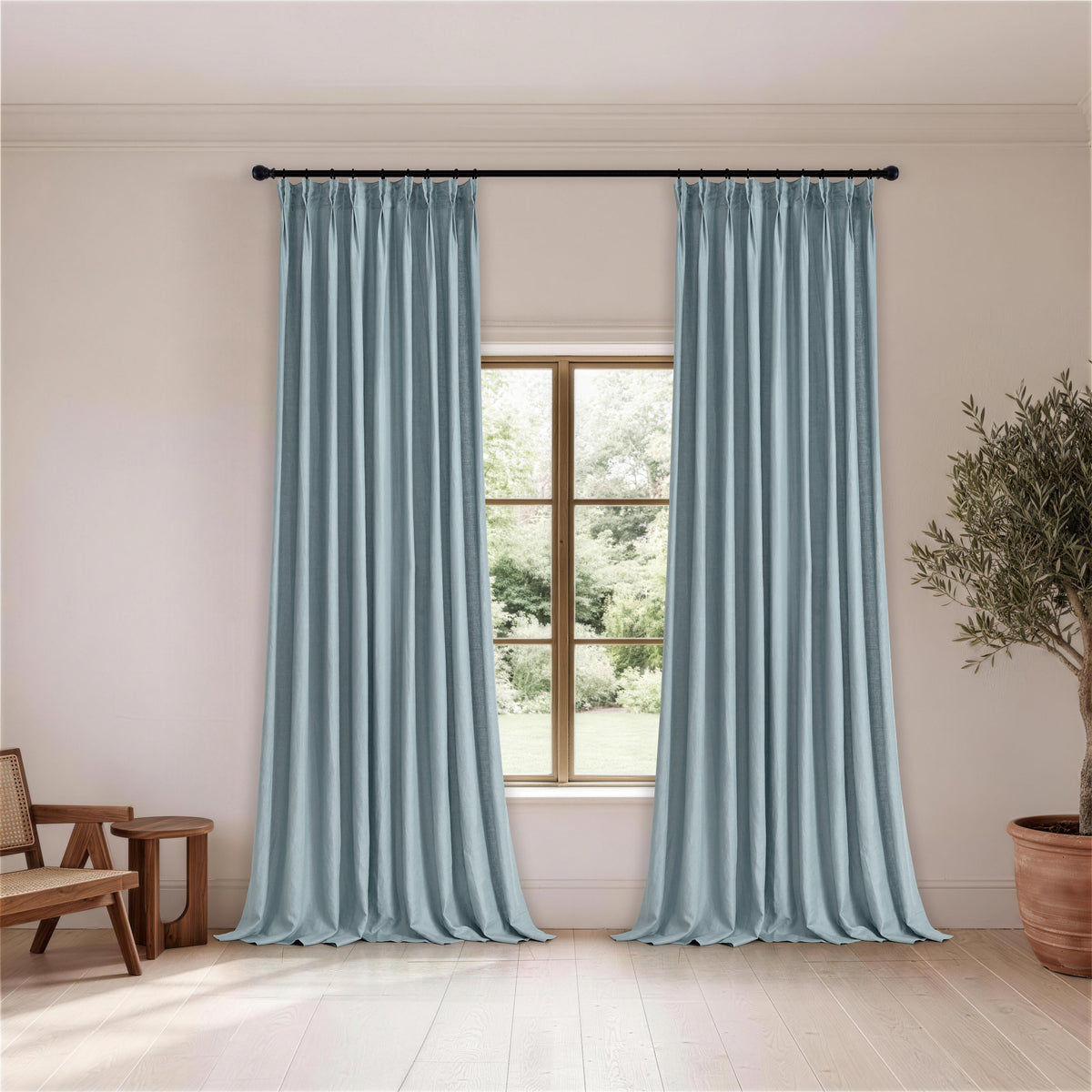 Maribel Lightweight Pure Linen Curtains in Slate Blue, hanging in a room