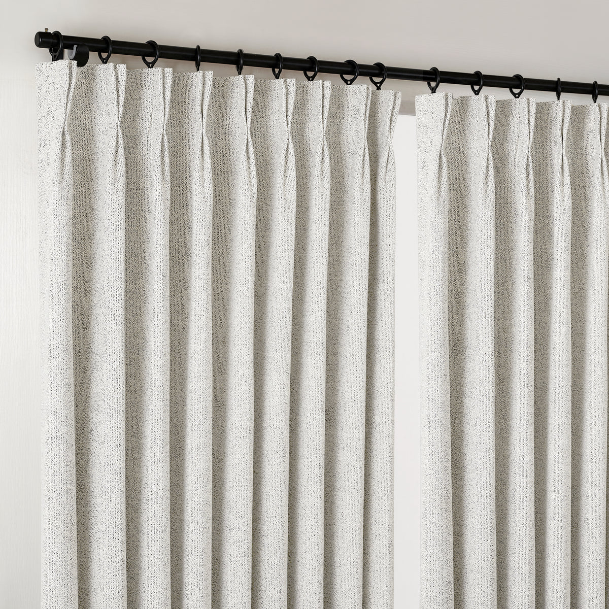 Pembroke Flecked Weave Curtains in Cool Chalk, hanging at the window