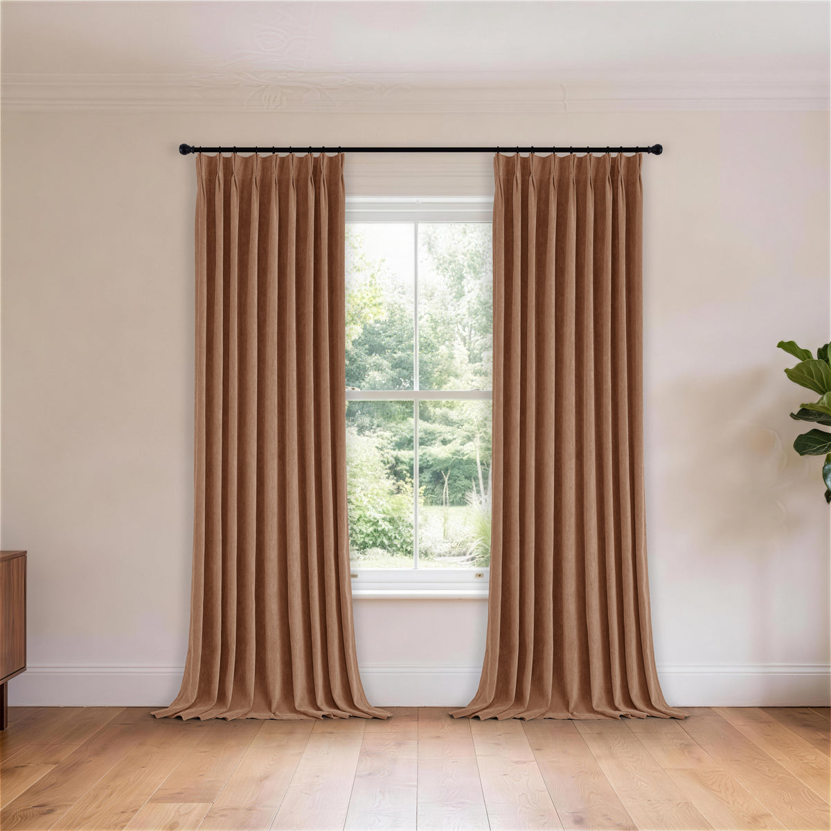 Cordelia Sculpted Chenille Blackout Curtains in Cocoa, hanging in a room