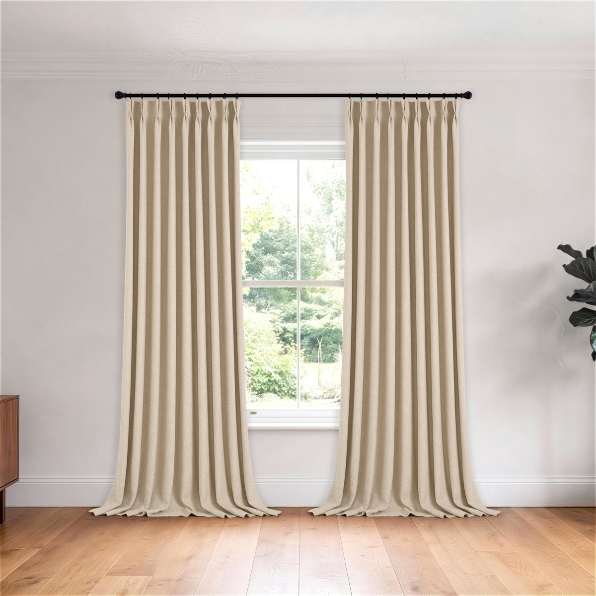 Kendall Basketweave Blackout Curtains in Stone, hanging in a room