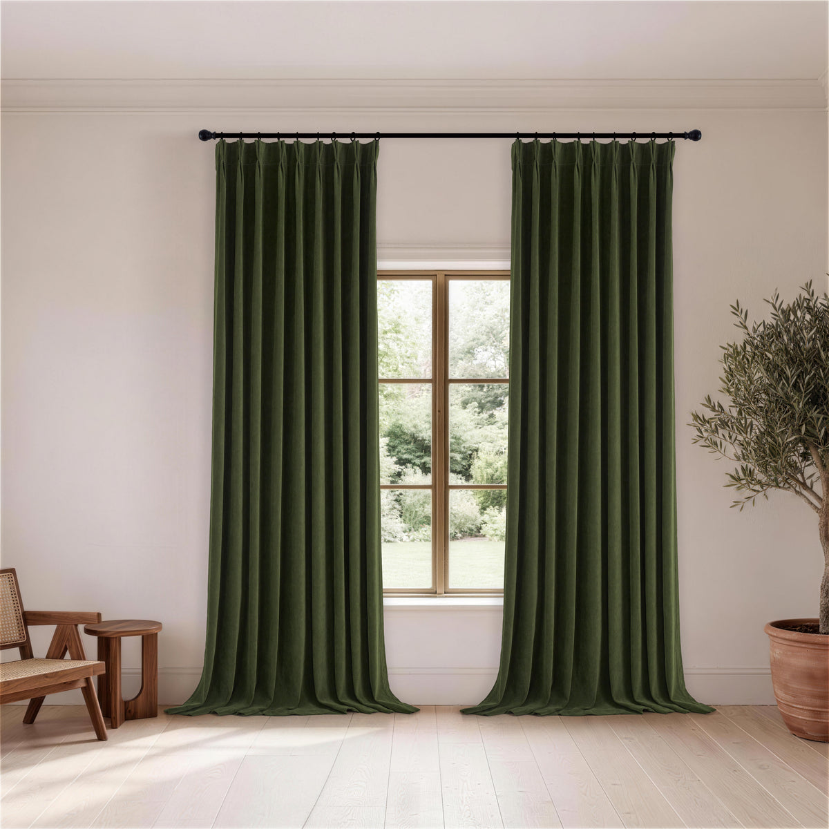 Ingram Brushed Weave Blackout Curtains in Forest, hanging in a room