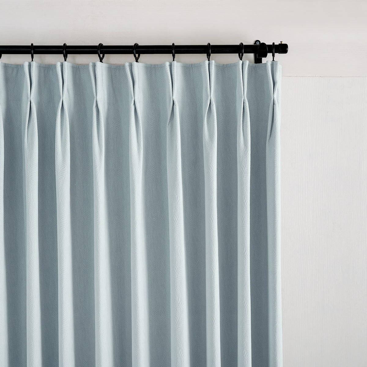 Cordelia Sculpted Chenille Blackout Curtains in Dusty Blue, pleated header close up