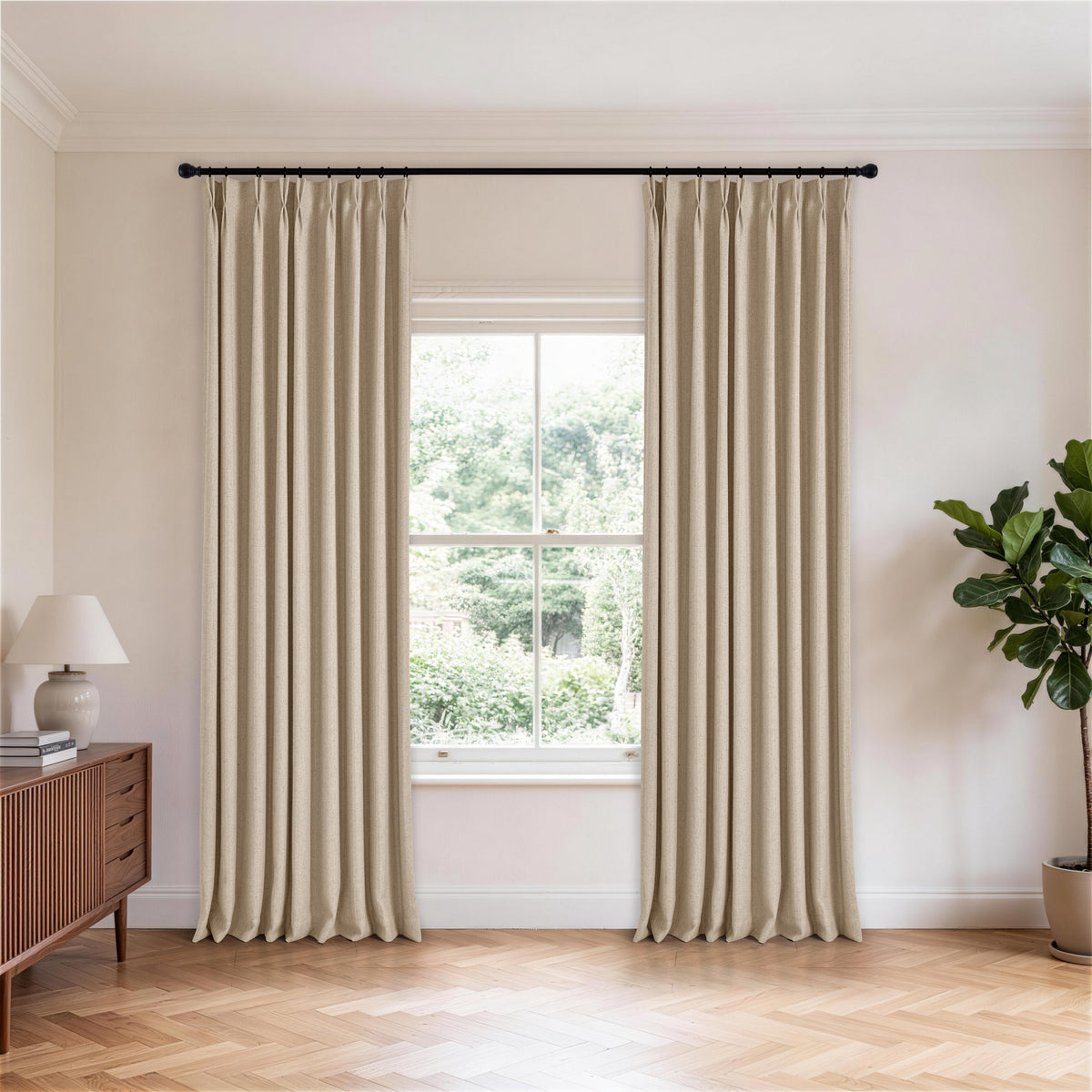 Ansel Slub Weave Curtains in Pale Stone, hanging in a room