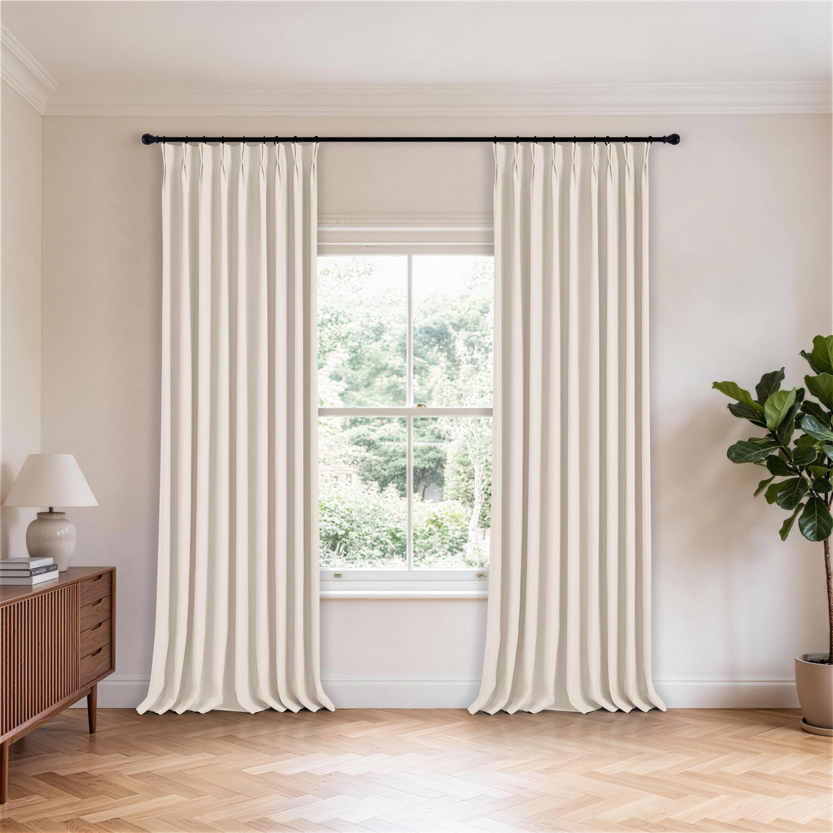 Ingram Brushed Weave Blackout Curtains in Warm Chalk, hanging in a room