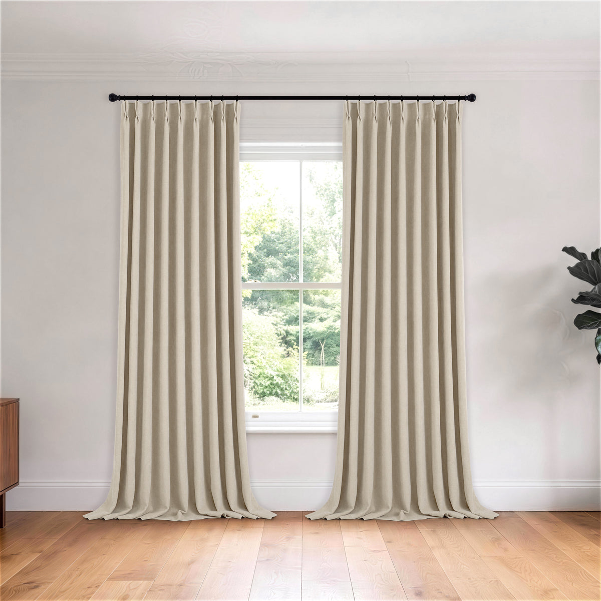 Hadleigh Herringbone Blackout Curtains in Greige, hanging in a room