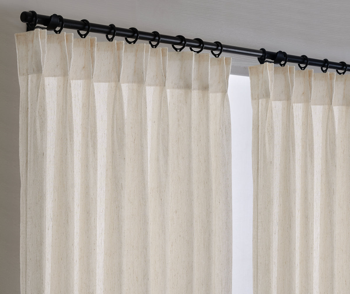 Isabeau Chevron Voile Sheer Curtains in Chalk, hanging at the window