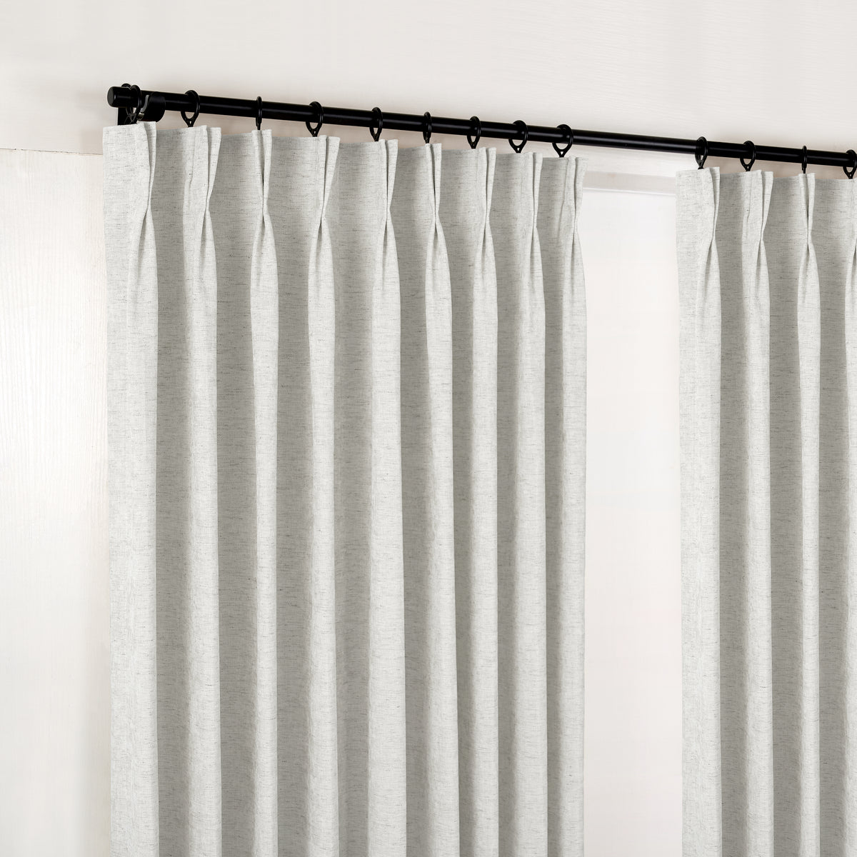 Prentiss Reversible Slub Curtains in Cool Greige, hanging at the window