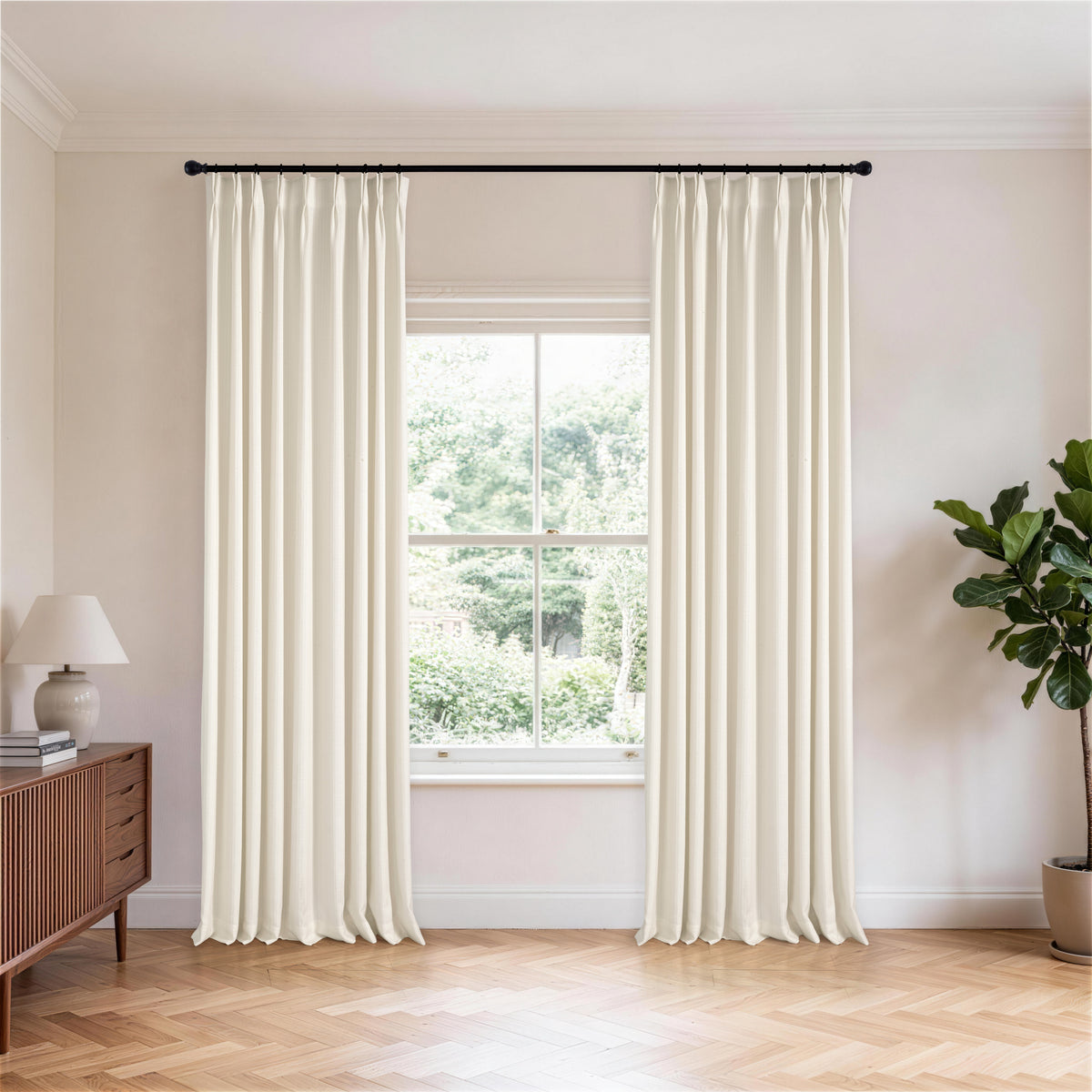 Ansel Slub Weave Curtains in Warm Chalk, hanging in a room