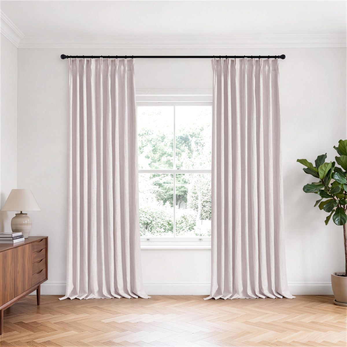 Rafe Slubbed Pure Linen Curtains in Dusty Rose, hanging in a room