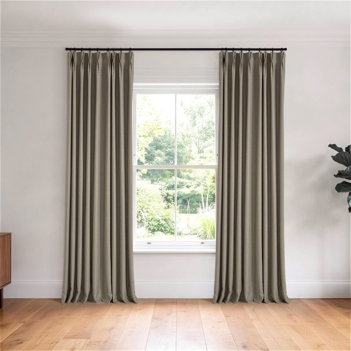 Forrester Linen-Blend Slub Curtains in Cocoa, hanging in a room