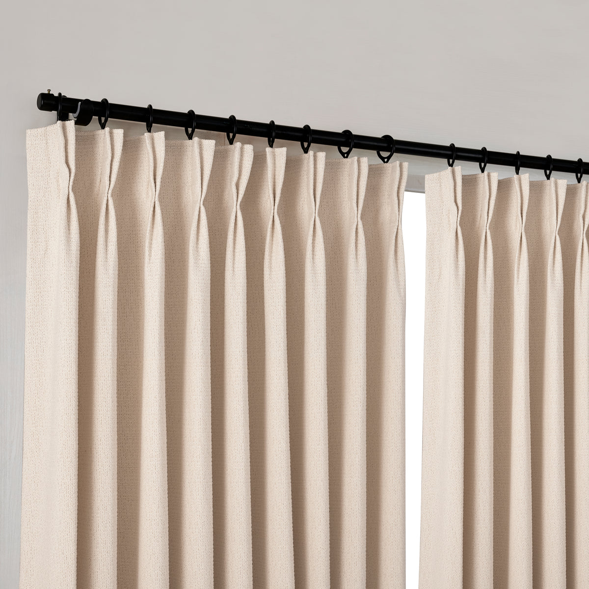 Pembroke Basket Weave Curtains in Blush, hanging at the window