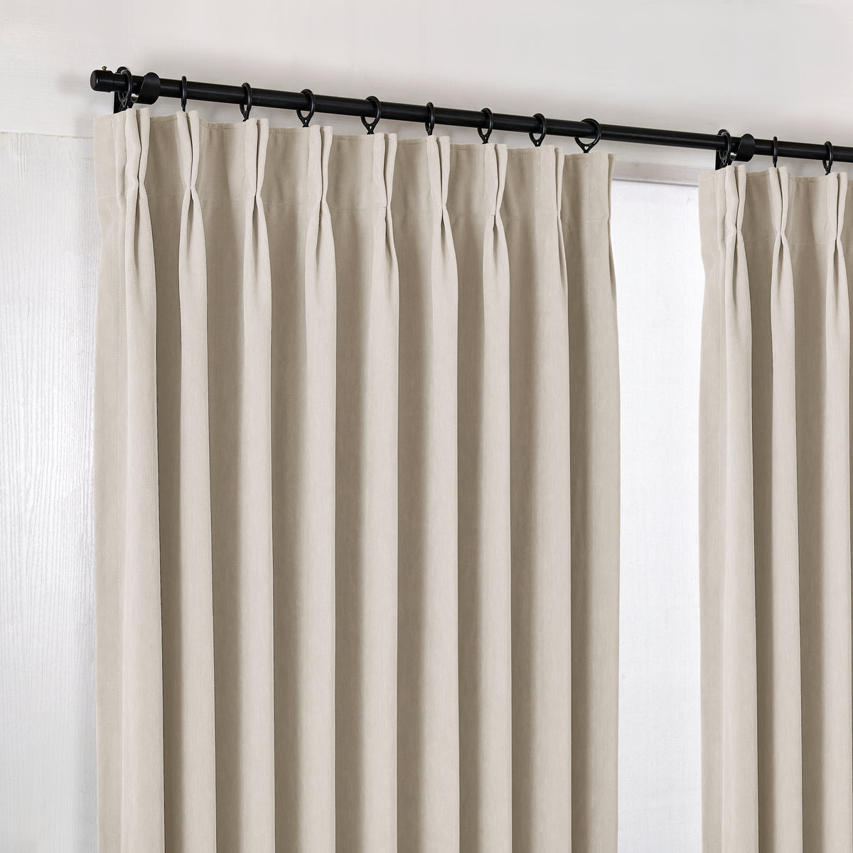 Genevieve Cloud-Soft Chenille Blackout Curtains in Greige, hanging at the window